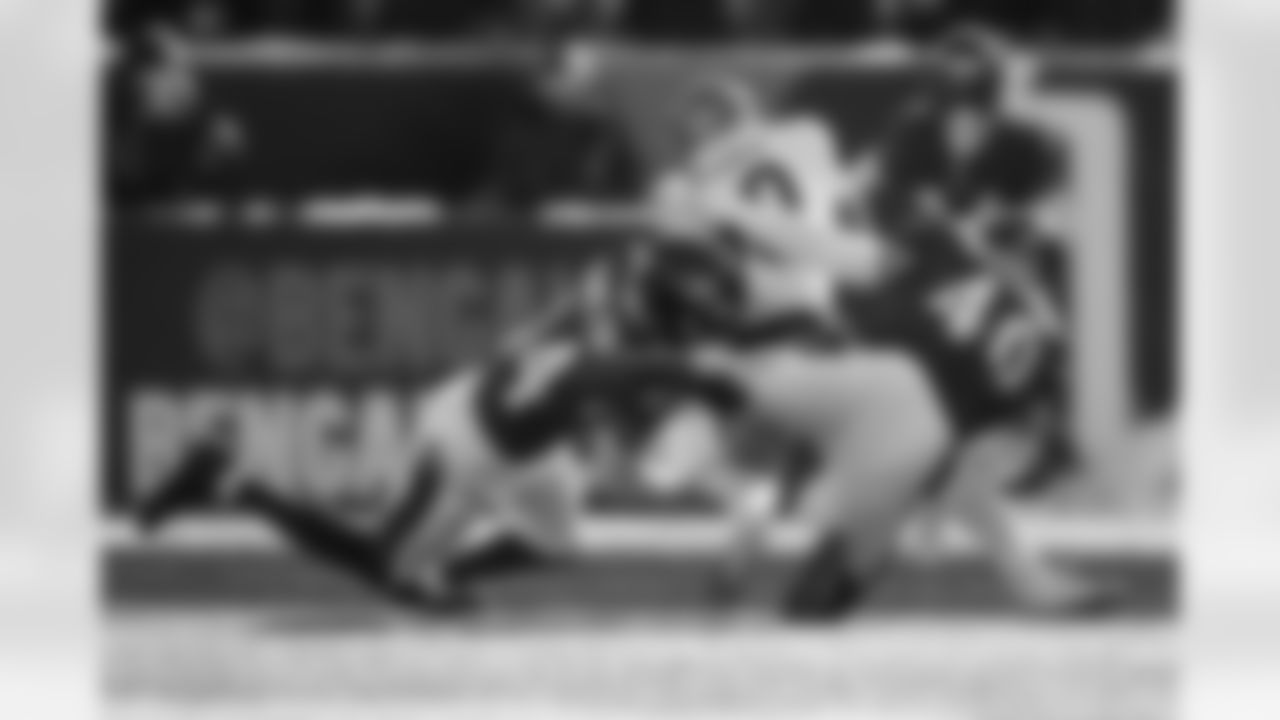 S Kyle Hamilton (left) & ILB Teddye Buchanan (right)