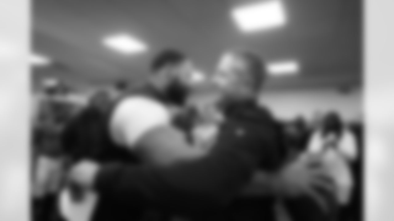 NT Travis Jones (left) & Head Coach John Harbaugh (right)