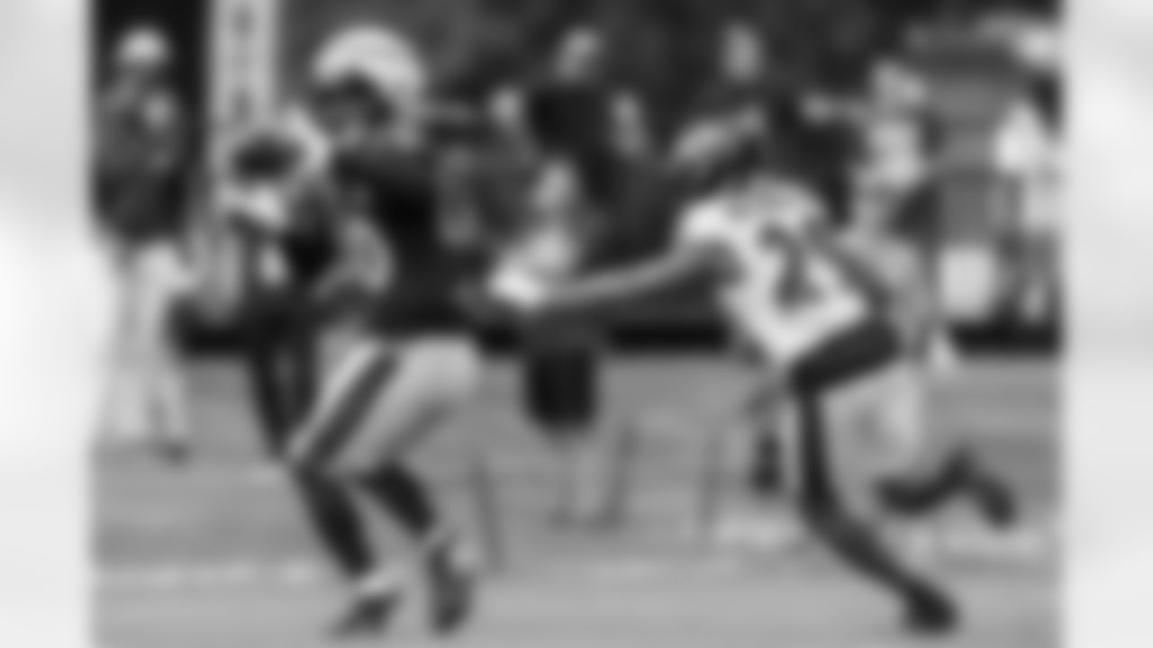 TE Isaiah Likely with S Ar'Darius Washington in coverage.