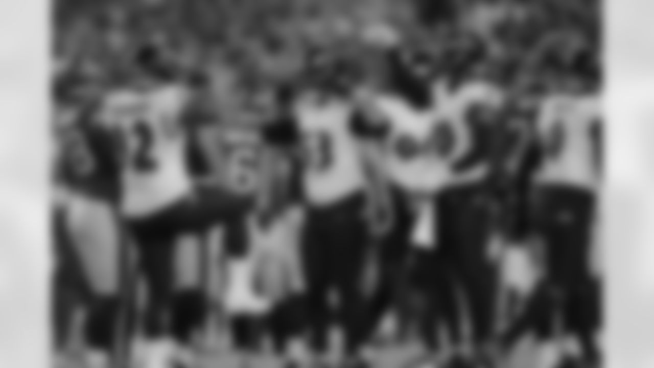 Ravens defense celebrates a sack.