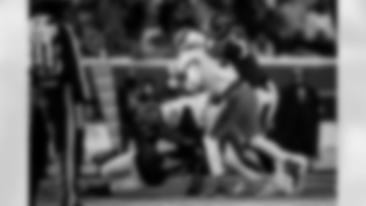 OLB Dre'Mont Jones (left) & DT Travis Jones (right)