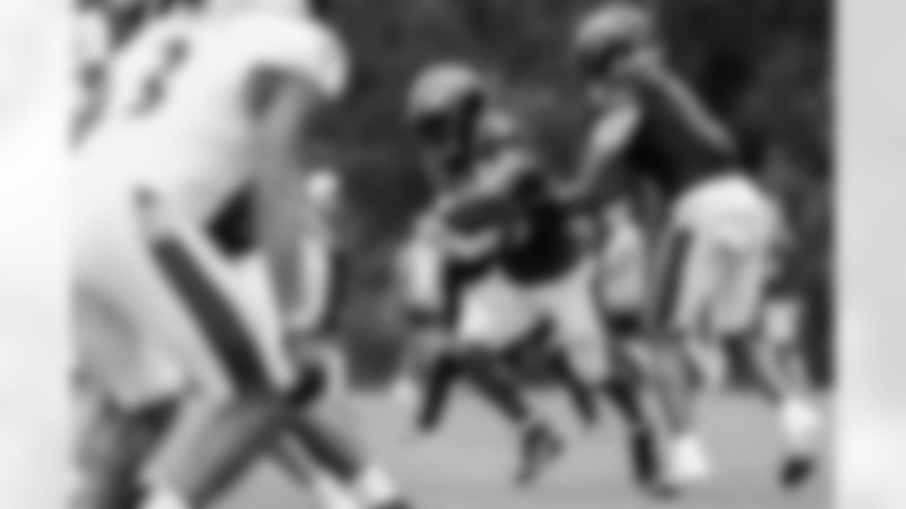 RB Justice Hill (left) & QB Lamar Jackson (right)