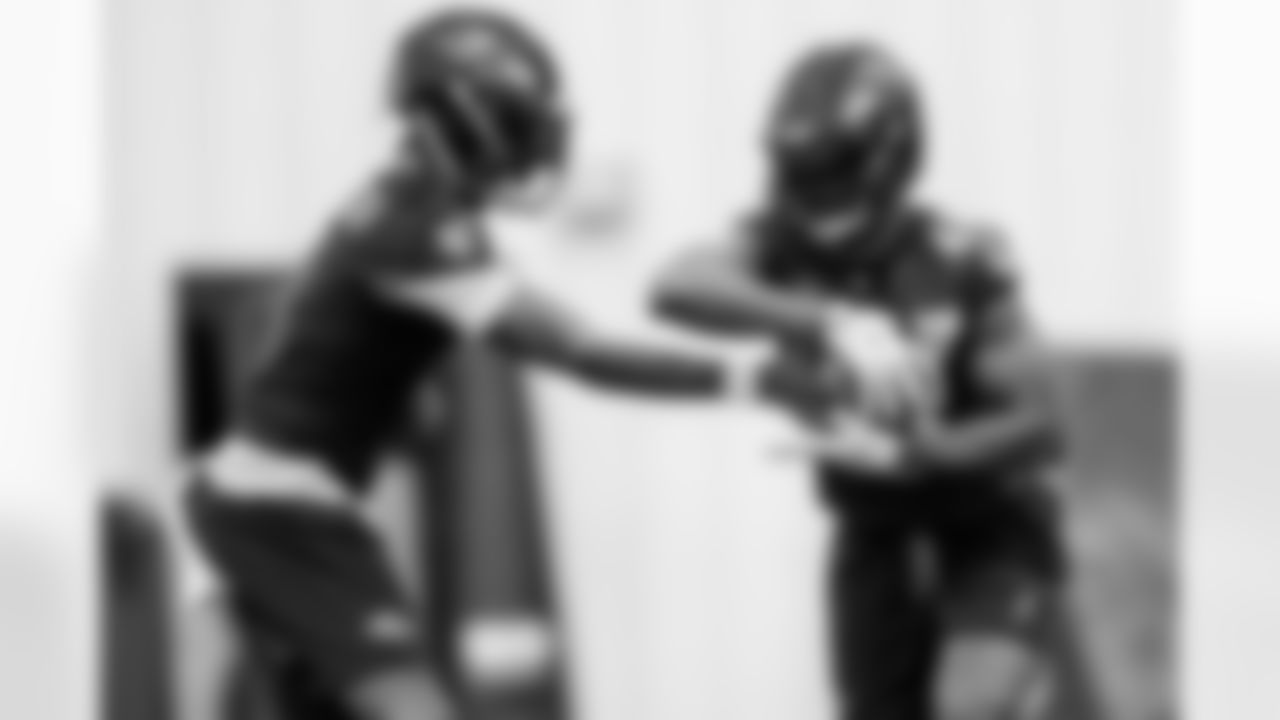 QB Lamar Jackson (left) & RB Justice Hill (right)