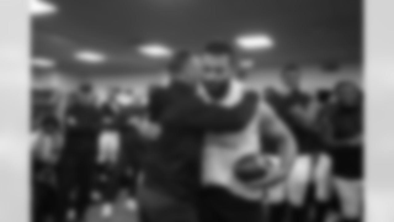 Head Coach John Harbaugh (left) & OLB Kyle Van Noy (right)