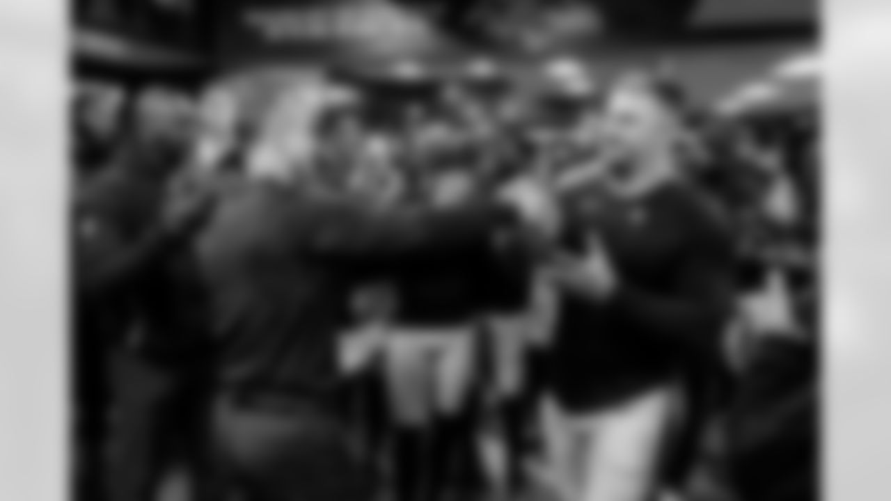 Head Coach John Harbaugh (left) & LS Nick Moore (right)