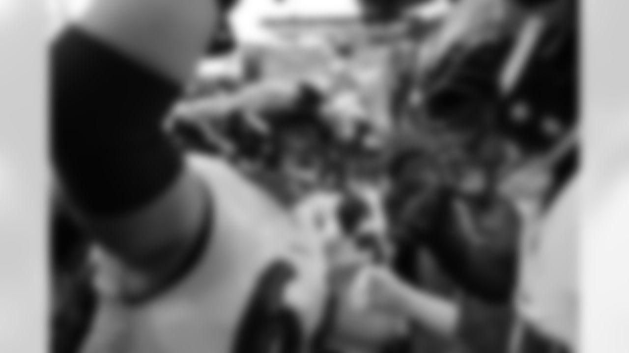 (from left) C Tyler Linderbaum & OLB Mike Green