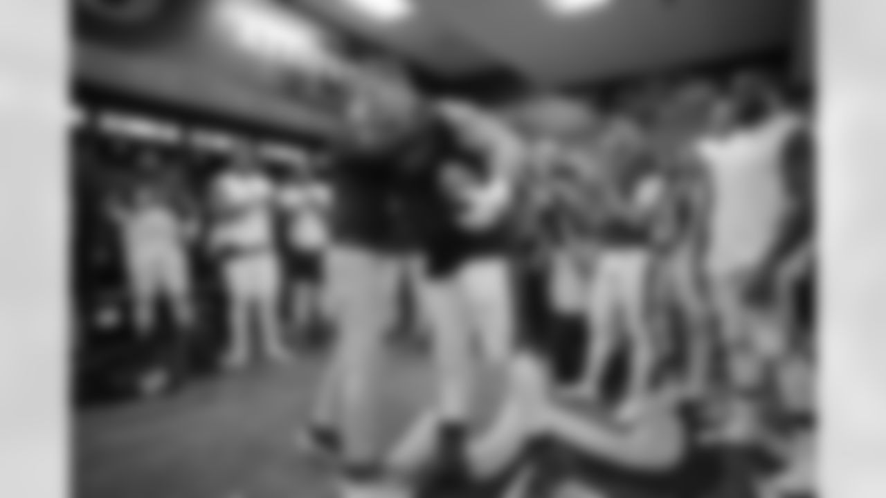 The Ravens' celebrated in the locker room following a 37-3 victory over the Seattle Seahawks.