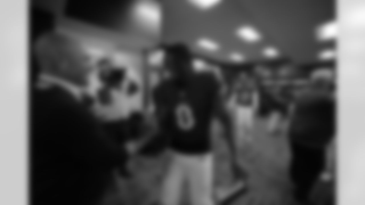 The Ravens' celebrated in the locker room following a 37-3 victory over the Seattle Seahawks.