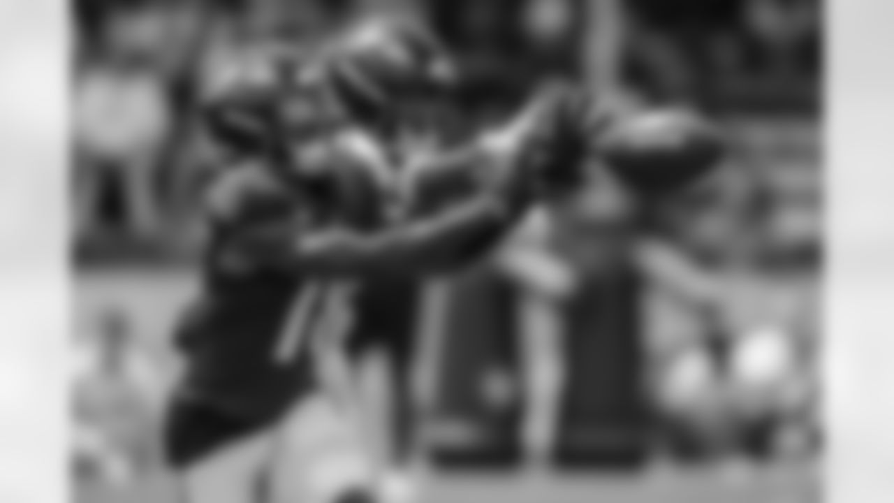 WR Dayton Wade with CB Nate Wiggins in coverage.