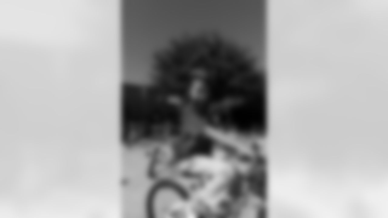 New Orleans Saints quarterback Tyler Shough and defensive end Cam Jordan joined Raising Cane's to surprise 100 kids from the Boys and Girls Club of Metro Louisiana with new bikes and helmets for the holidays on Tuesday, Dec. 9, 2025.