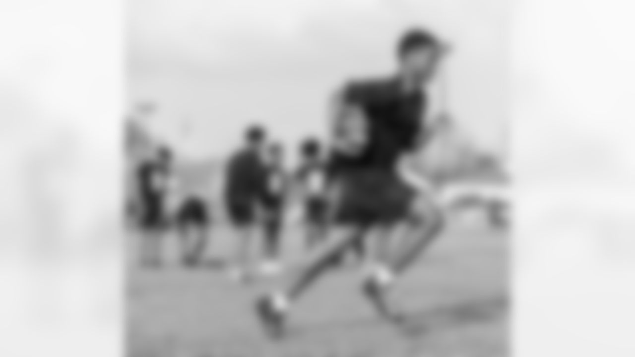 The New Orleans Saints visited McDonogh 35 High School in New Orleans on Thursday, March 14, 2024 to hold another part of their "New Orleans Saints High School Summer Workout" series.