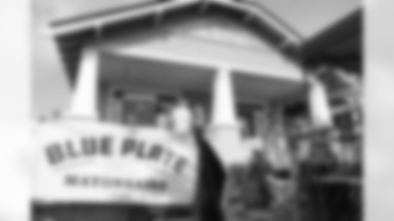Staff members for the New Orleans Saints and Blue Plate Mayonnaise participated in the 2025 Build and Boil put on by Rebuilding Together New Orleans on Saturday, May 17, 2025. Volunteers participated in home repairs and then enjoyed a crawfish boil.
