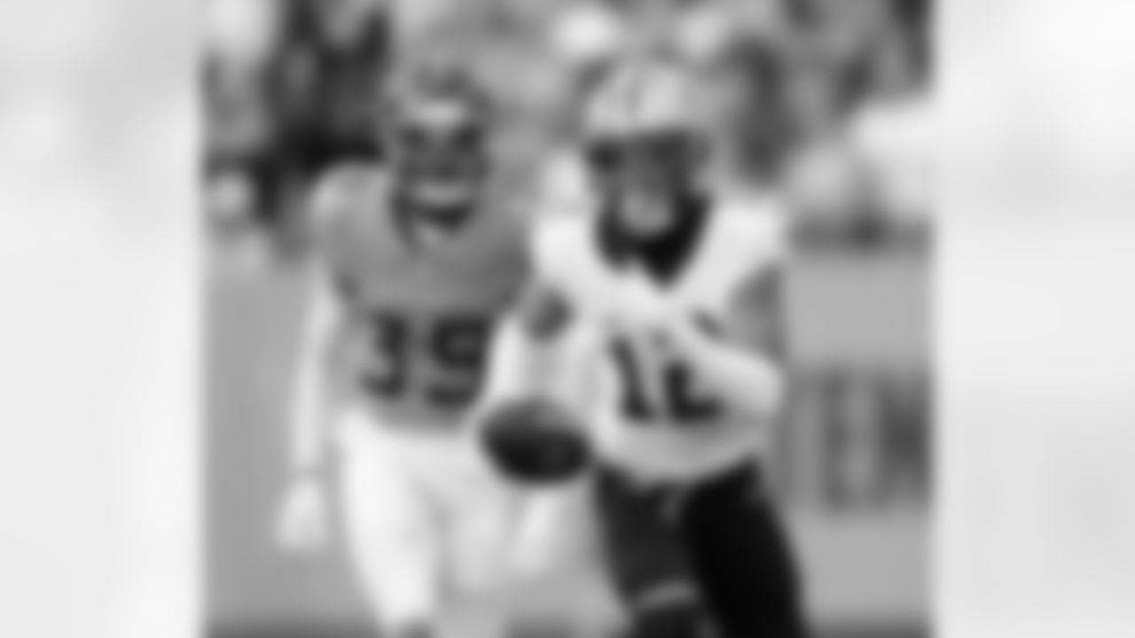 WR Chris Olave (12) runs with the ball during the New Orleans Saints game against the Tennessee Titans for Week 17 of the 2025 NFL season on Dec. 28, 2025 at Nissan Stadium.