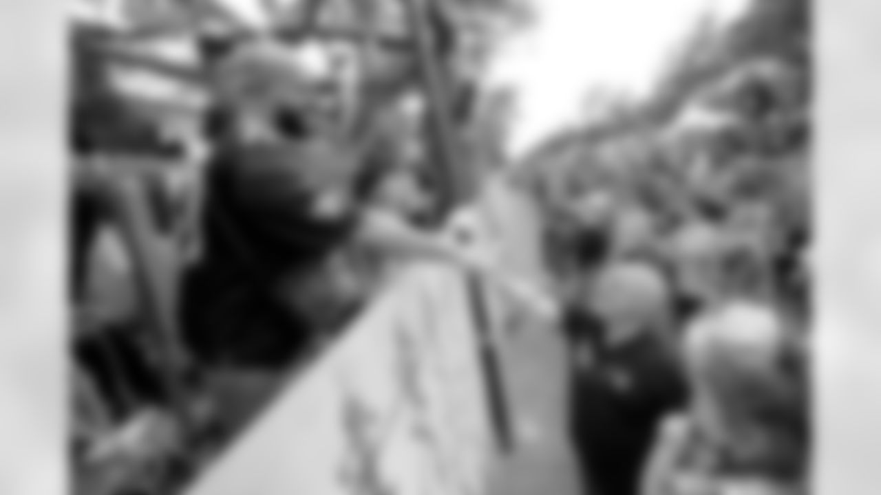 New Orleans Saints players rode down the Uptown route with the 2,100 members of the Krewe of Tucks as they presented their 56th annual parade entitled "Tucks faces the music" on Saturday, February 10 during the 2024 Mardi Gras season.