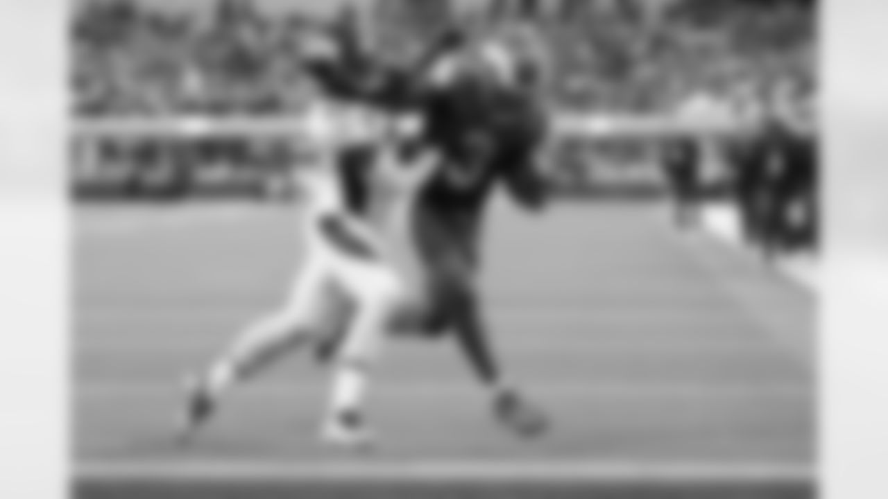 Los Angeles Rams running back Cam Akers scores past Denver Broncos cornerback Damarri Mathis during the second half of an NFL football game between the Los Angeles Rams and the Denver Broncos on Sunday, Dec. 25, 2022, in Inglewood, Calif.