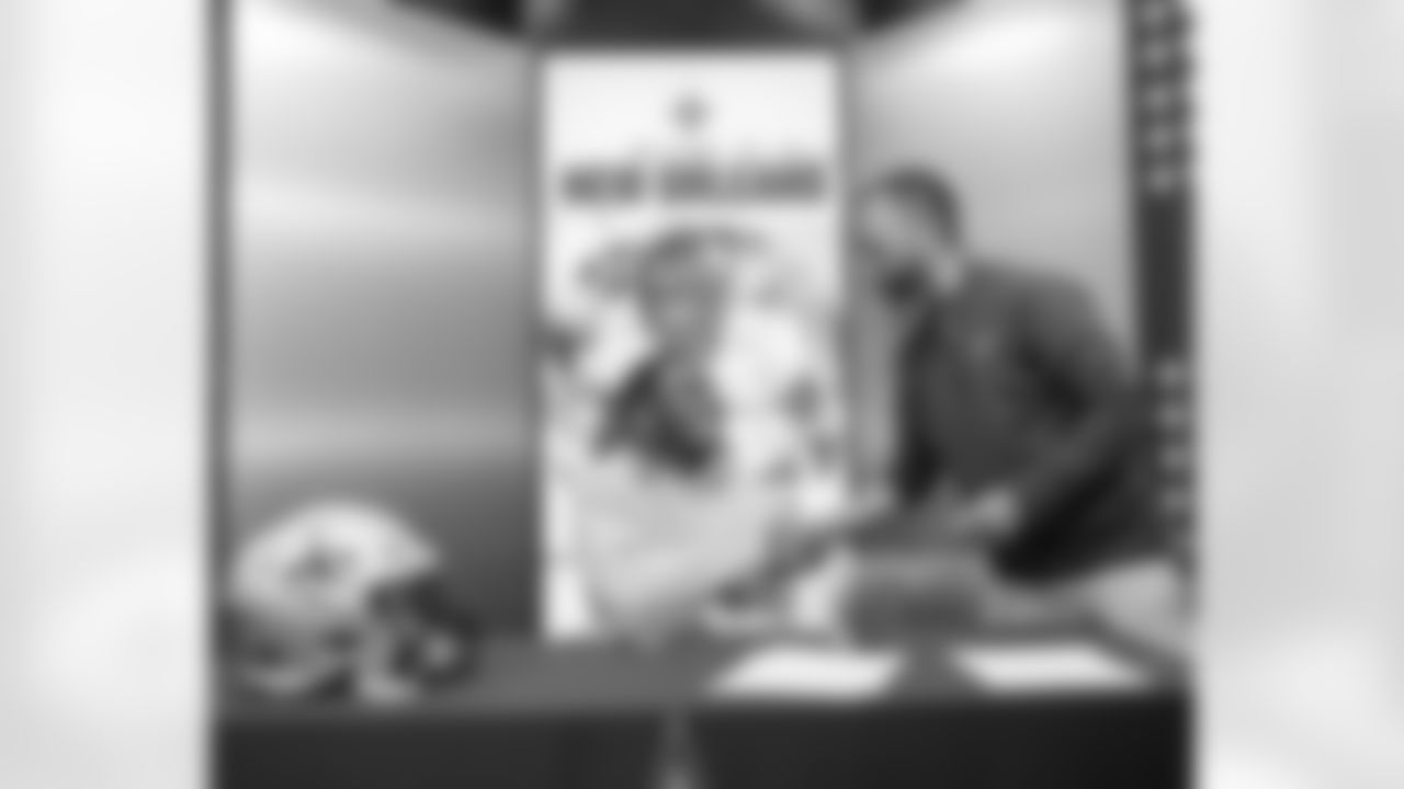 Members of the New Orleans Saints 2025 NFL Draft class sign their rookie contracts at the Ochsner Sports Performance Center.