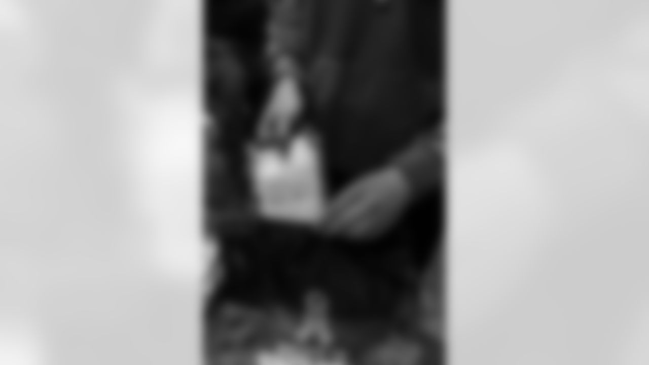 New Orleans Saints owner Gayle Benson and legend Pat Swilling joined volunteers from Entergy and the American Red Cross to assemble care packages for military members as part of the NFL's Salute to Service month on Tuesday, Nov. 11, 2025.