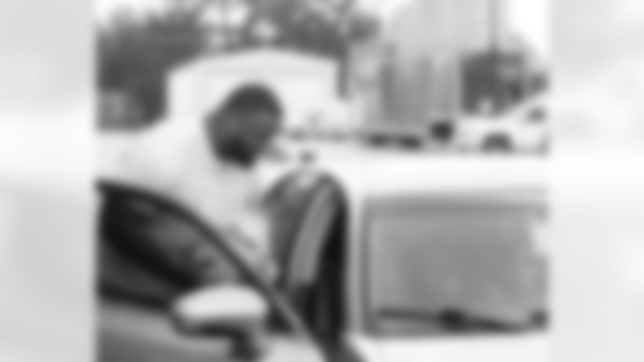 New Orleans Saints defensive tackle Davon Godchaux hosted a Thanksgiving turkey distribution for local residents at the COPAC Community Center on Nov. 25, 2025. The Plaquemine High School football team assisted Godchaux in the giveaway.