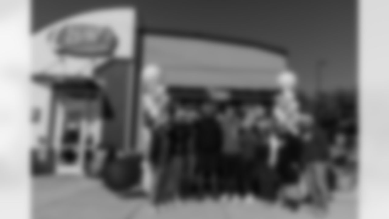 New Orleans Saints quarterback Tyler Shough and defensive end Cam Jordan joined Raising Cane's to surprise 100 kids from the Boys and Girls Club of Metro Louisiana with new bikes and helmets for the holidays on Tuesday, Dec. 9, 2025.