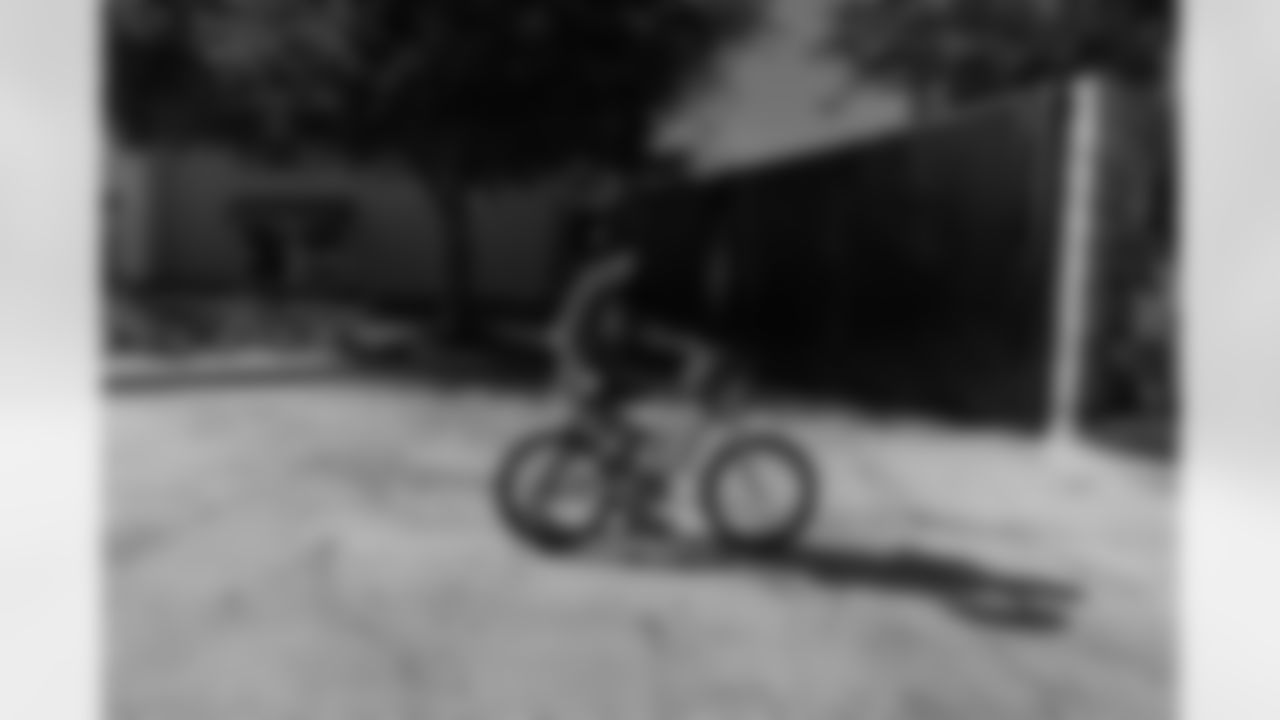 New Orleans Saints quarterback Tyler Shough and defensive end Cam Jordan joined Raising Cane's to surprise 100 kids from the Boys and Girls Club of Metro Louisiana with new bikes and helmets for the holidays on Tuesday, Dec. 9, 2025.