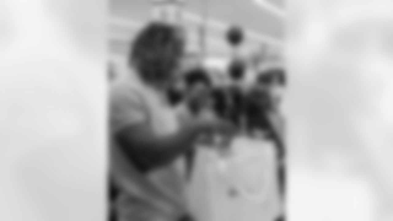 New Orleans Saints safety Justin Reid hosted his annual "Justin's Thanksgiving Grocery Grab" shopping spree for local shoppers on Nov. 24, 2025. Saints safety Terrell Burgess assisted their teammate during the event.