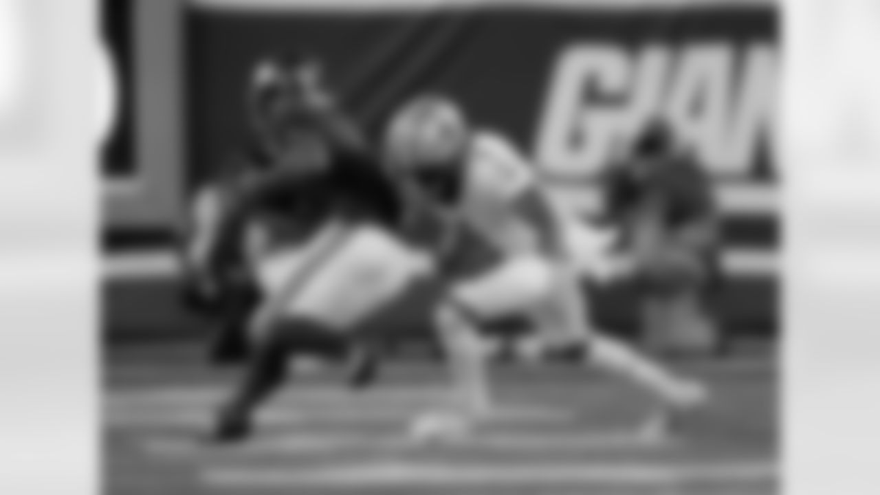 CB Alontae Taylor (1) goes for the tackle during the New Orleans Saints game against the New York Giants for Week 14 of the 2024 NFL Season on Dec. 8, 2024 at MetLife Stadium.