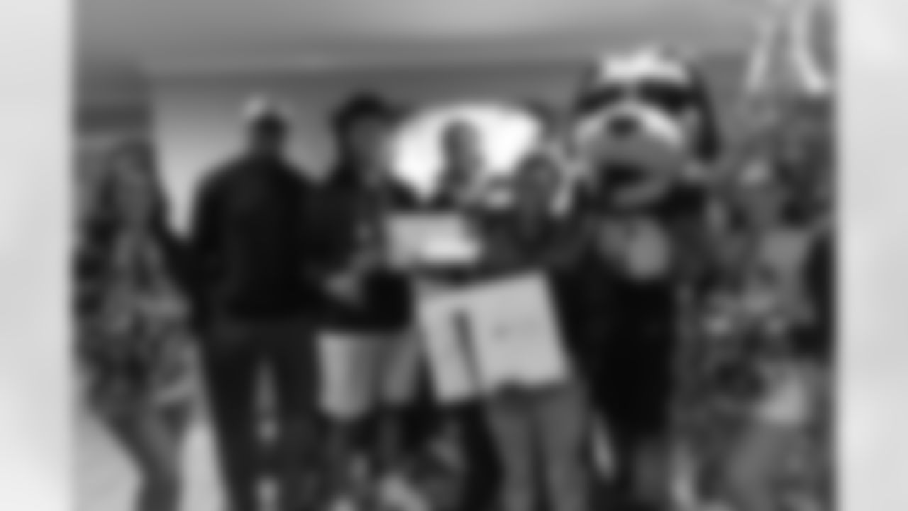 New Orleans Saints tight end Juwan Johnson, cornerback Alontae Taylor, and wide receiver Devaughn Vele attended the Louisiana Cat Hope Ignites Holiday Party on Tuesday, Dec. 16, 2025.