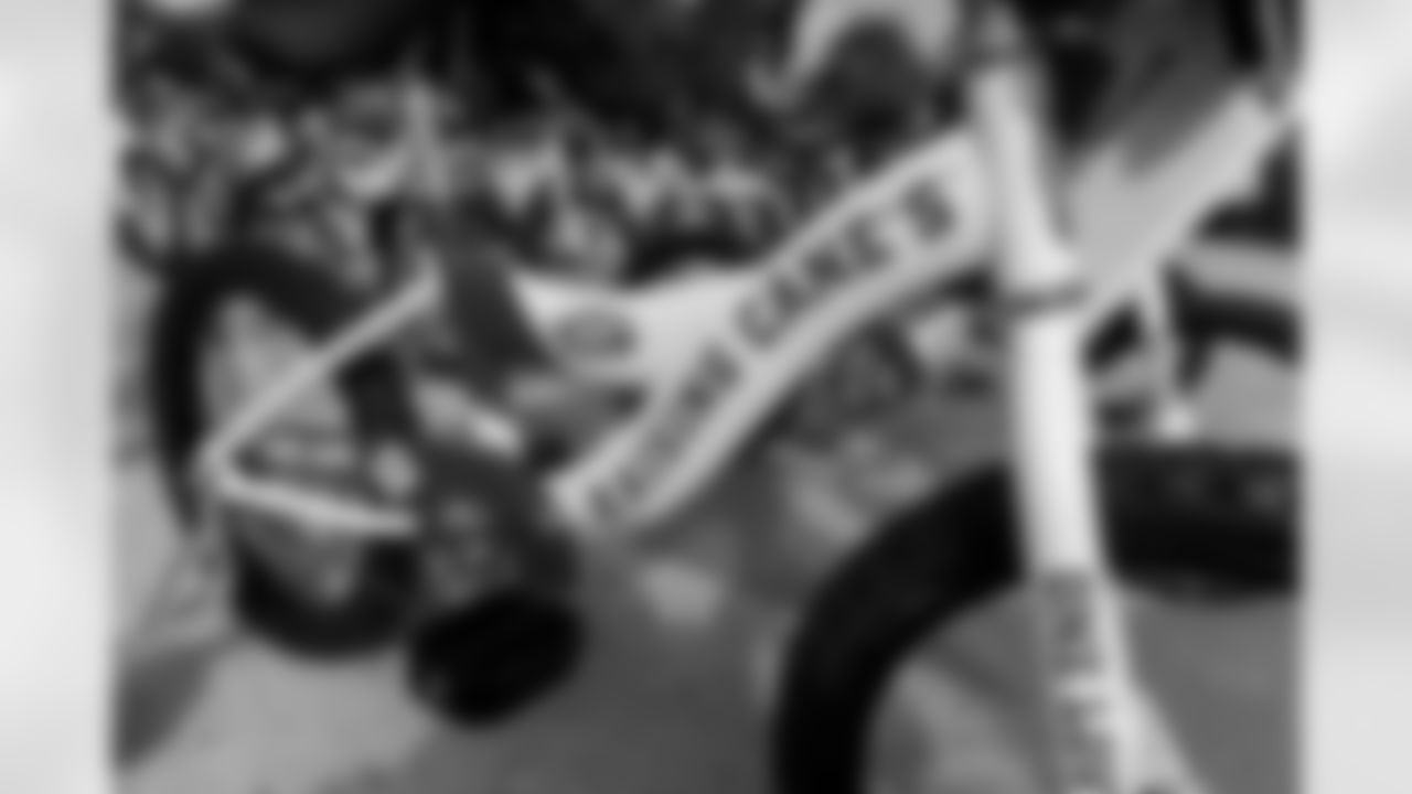 New Orleans Saints quarterback Tyler Shough and defensive end Cam Jordan joined Raising Cane's to surprise 100 kids from the Boys and Girls Club of Metro Louisiana with new bikes and helmets for the holidays on Tuesday, Dec. 9, 2025.