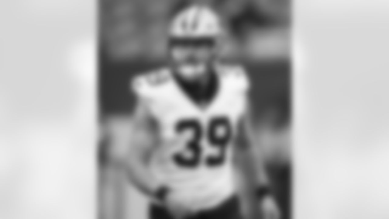 Check out photos of New Orleans Saints punter Lou Hedley in action throughout the 2023 NFL season.