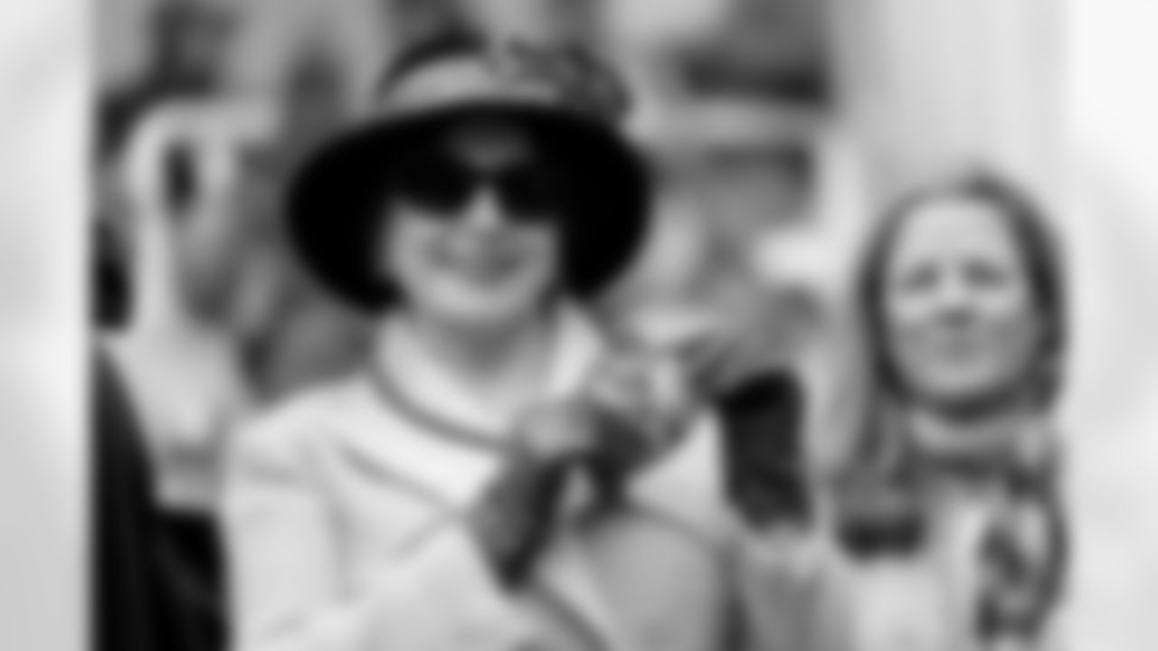 Photos of New Orleans Saints owner Gayle Benson enjoying Mardi Gras day outside of Gallier Hall on Tuesday, Feb. 13, 2024.