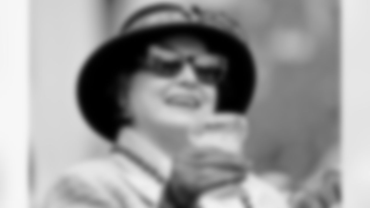 Photos of New Orleans Saints owner Gayle Benson enjoying Mardi Gras day outside of Gallier Hall on Tuesday, Feb. 13, 2024.