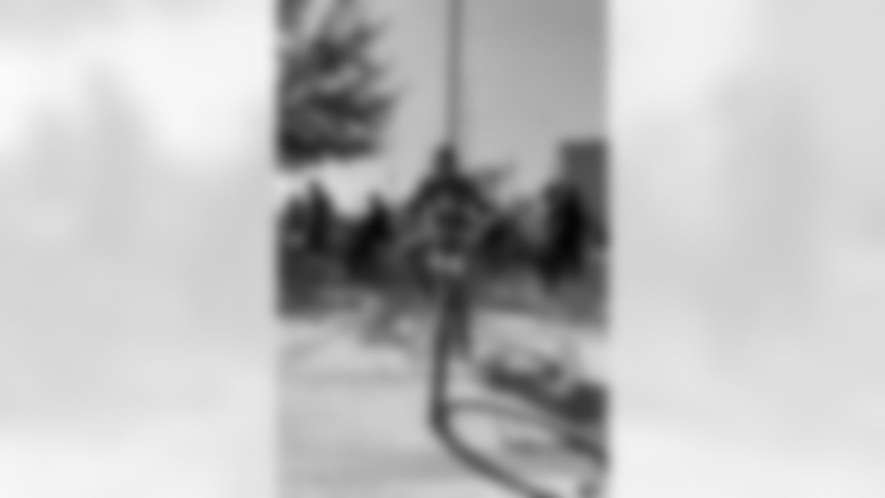 New Orleans Saints quarterback Tyler Shough and defensive end Cam Jordan joined Raising Cane's to surprise 100 kids from the Boys and Girls Club of Metro Louisiana with new bikes and helmets for the holidays on Tuesday, Dec. 9, 2025.