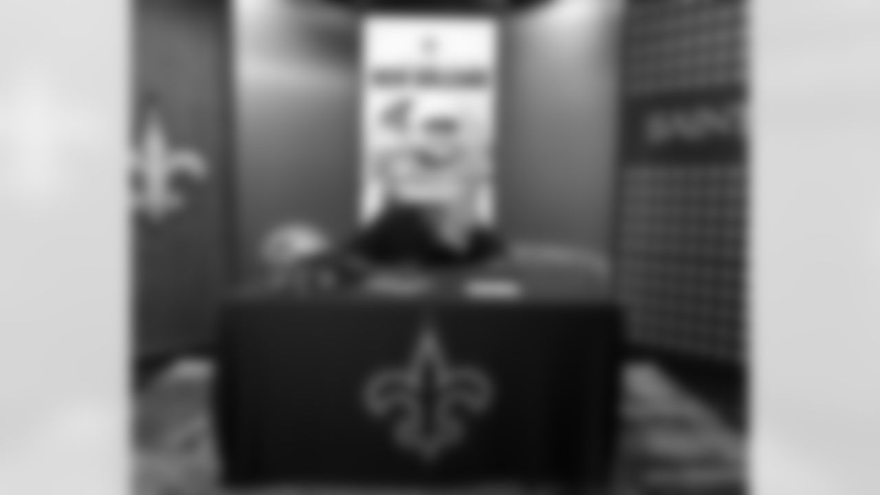 Members of the New Orleans Saints 2025 NFL Draft class sign their rookie contracts at the Ochsner Sports Performance Center.