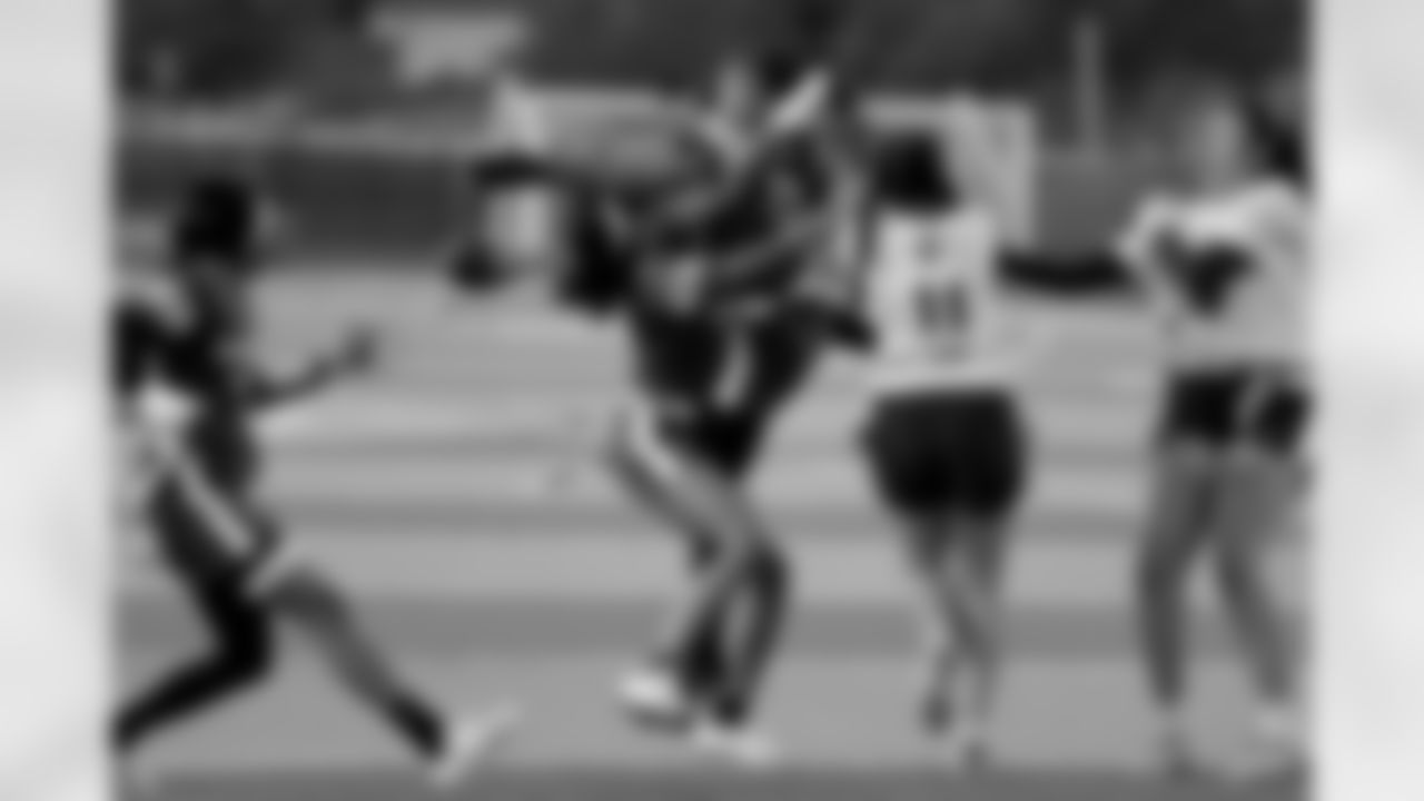 New Orleans Saints cornerback Rico Payton threw the coin toss to kickoff Day 1 of Week 4 games as Louisiana Flag Football teams competed during the 2025 Saints Girls High School Flag Football season on Monday, April 14, 2025.