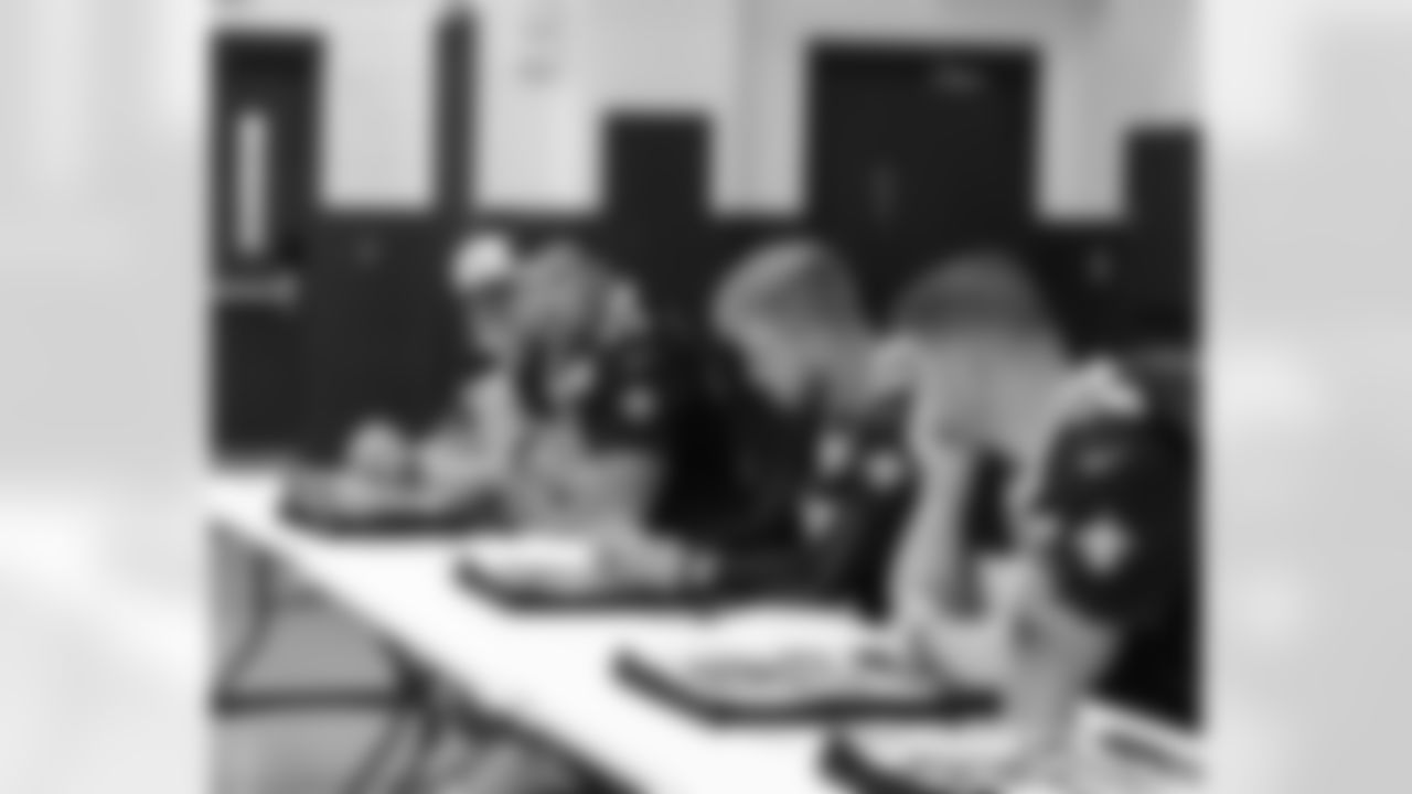 New Orleans Saints players Tyler Shough, Dillon Radunz, Treyton Welch, Will Clapp, and Erik McCoy visited St. Pius Elementary, spending the afternoon answering student questions and signing autographs on Tuesday, Nov. 18, 2025.