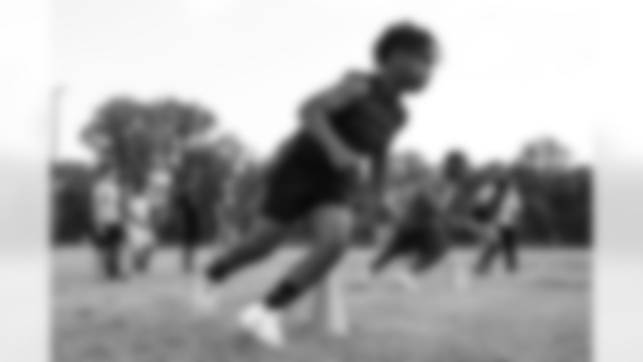 The New Orleans Saints hosted a youth football camp at Bayou Manchac Park in Baton Rouge on Tuesday, June 11, 2024. Campers learned both offensive and defensive drills that they can use to help develop their skills.