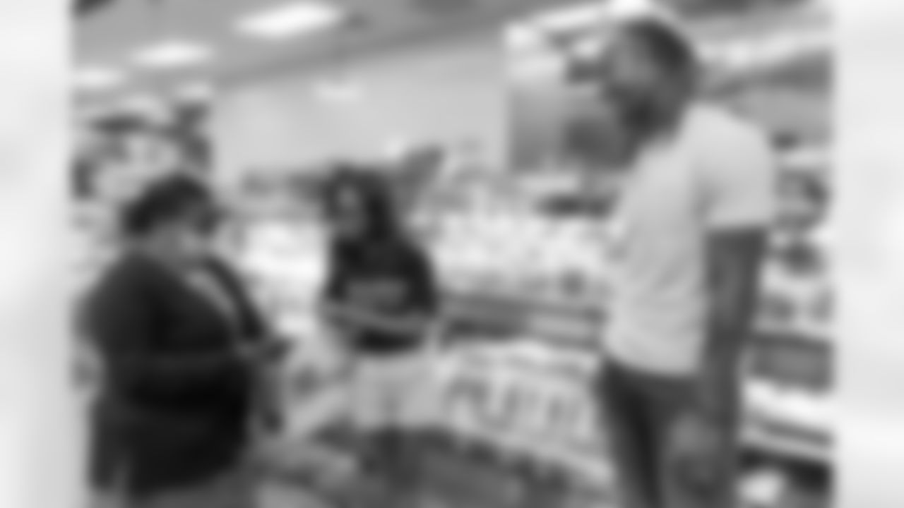 New Orleans Saints safety Justin Reid hosted his annual "Justin's Thanksgiving Grocery Grab" shopping spree for local shoppers on Nov. 24, 2025. Saints safety Terrell Burgess assisted their teammate during the event.