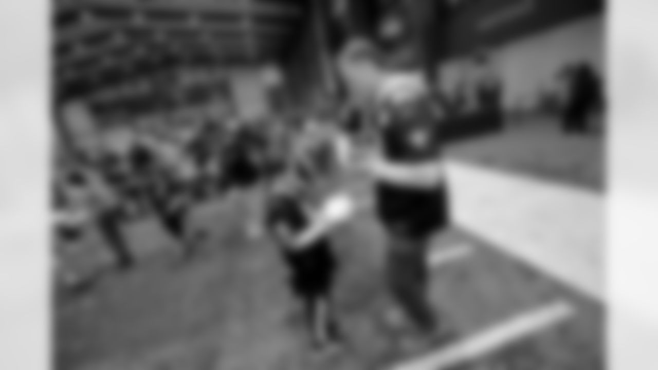 New Orleans Saints wide receiver Mason Tipton and linebacker Pete Werner joined members of the Saints Kids Club presented by Entergy, as well as the Pelicans and Saints Crib Clubs presented by Ochsner Children's Hospital, at the 2025 Holiday Huddle event on Wednesday, Dec. 10, 2025. Attendees enjoyed holiday-themed activities plus a Play Football Experience.