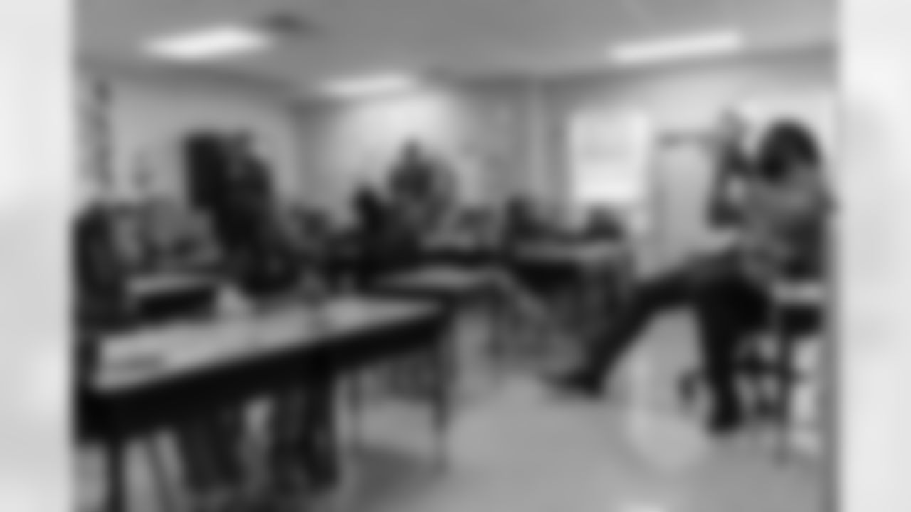 New Orleans Saints linebacker Demario Davis and his Devoted Dreamers Foundation teamed up with Ochsner to donate books and read to students during their Laureate Academy Book Fair on Tuesday, Dec. 9, 2025.