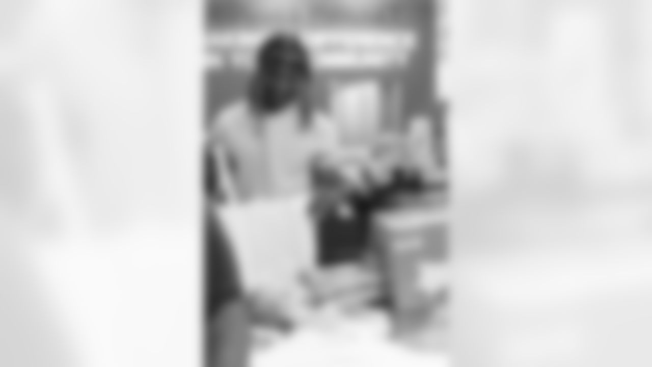 New Orleans Saints safety Justin Reid hosted his annual "Justin's Thanksgiving Grocery Grab" shopping spree for local shoppers on Nov. 24, 2025. Saints safety Terrell Burgess assisted their teammate during the event.