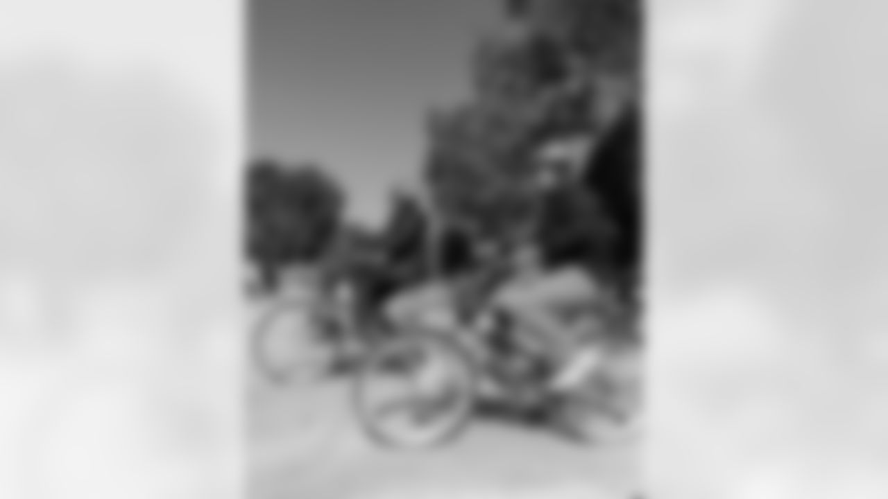 New Orleans Saints quarterback Tyler Shough and defensive end Cam Jordan joined Raising Cane's to surprise 100 kids from the Boys and Girls Club of Metro Louisiana with new bikes and helmets for the holidays on Tuesday, Dec. 9, 2025.