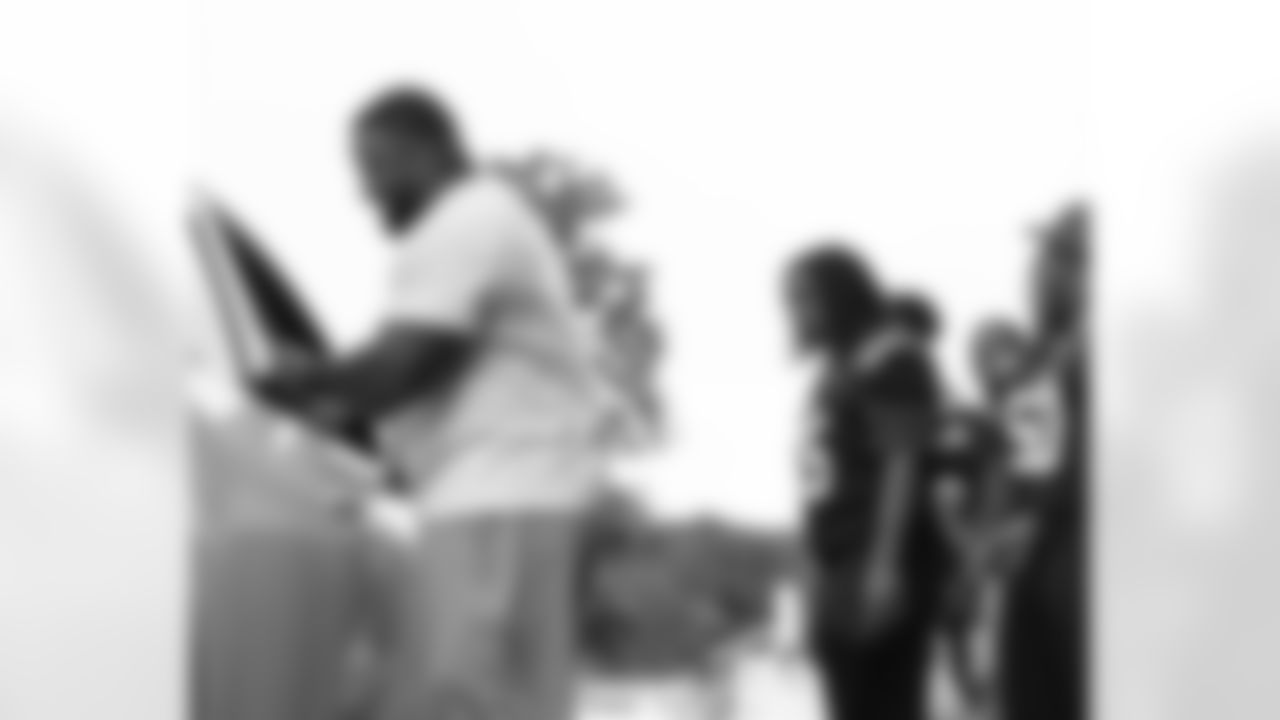 New Orleans Saints defensive tackle Davon Godchaux hosted a Thanksgiving turkey distribution for local residents at the COPAC Community Center on Nov. 25, 2025. The Plaquemine High School football team assisted Godchaux in the giveaway.