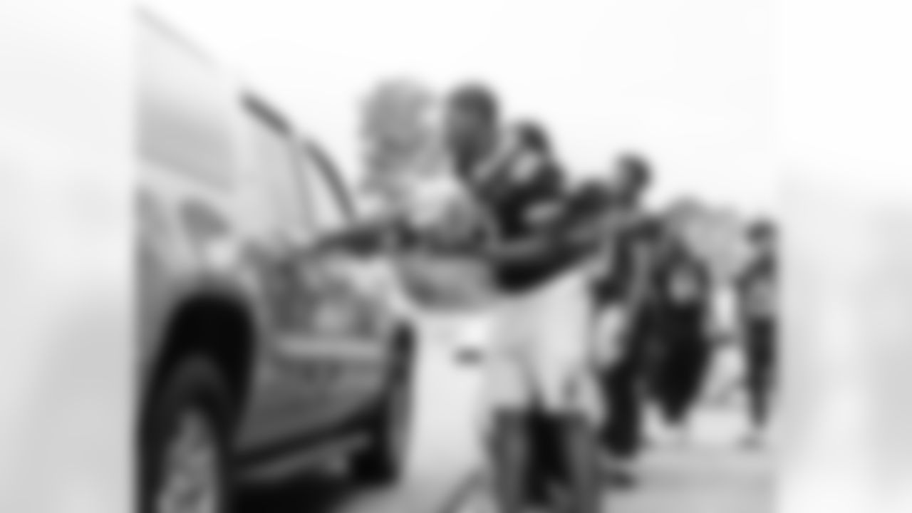 New Orleans Saints defensive tackle Davon Godchaux hosted a Thanksgiving turkey distribution for local residents at the COPAC Community Center on Nov. 25, 2025. The Plaquemine High School football team assisted Godchaux in the giveaway.