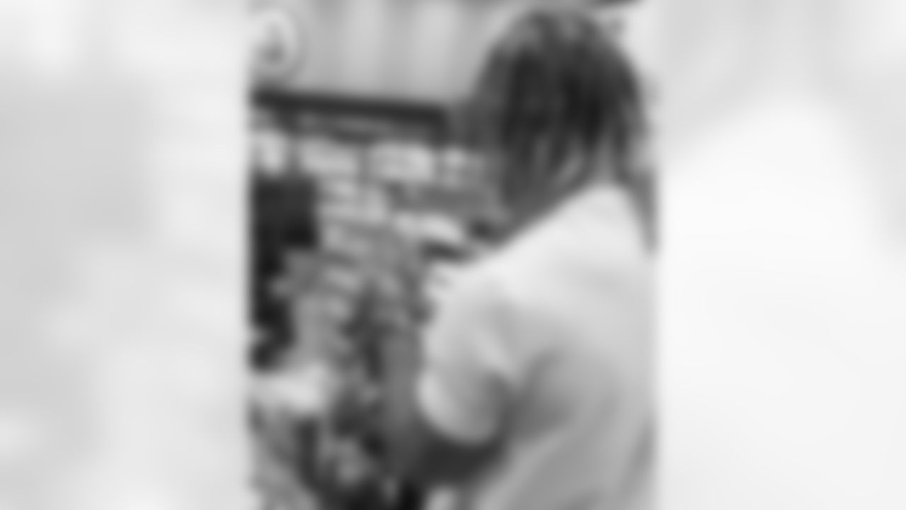 New Orleans Saints safety Justin Reid hosted his annual "Justin's Thanksgiving Grocery Grab" shopping spree for local shoppers on Nov. 24, 2025. Saints safety Terrell Burgess assisted their teammate during the event.