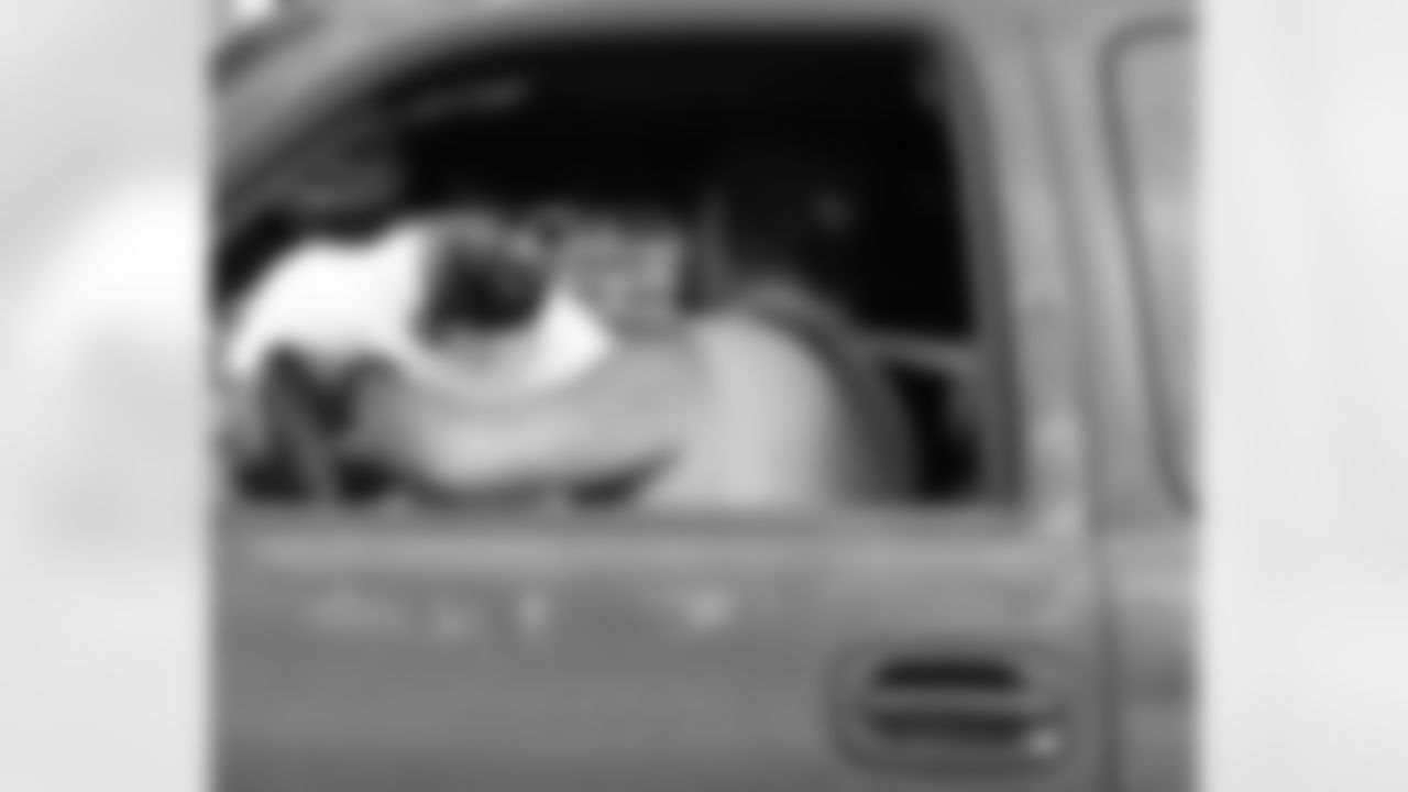 New Orleans Saints defensive tackle Davon Godchaux hosted a Thanksgiving turkey distribution for local residents at the COPAC Community Center on Nov. 25, 2025. The Plaquemine High School football team assisted Godchaux in the giveaway.