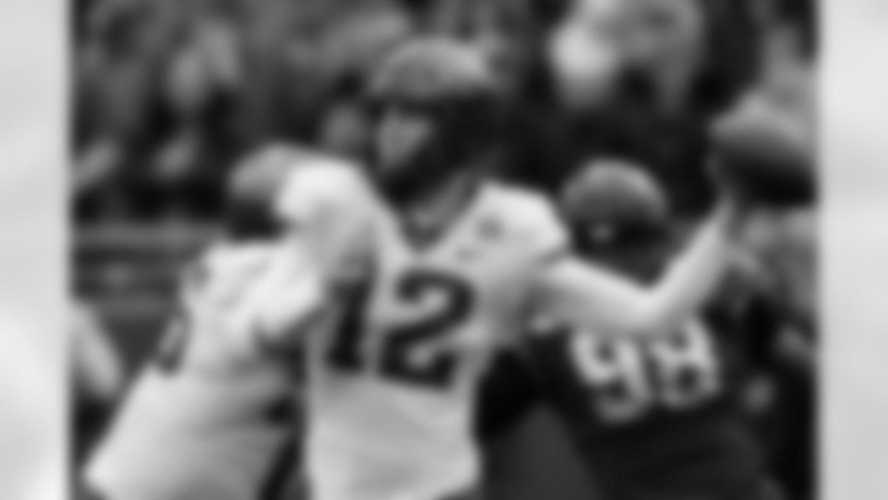 Iowa State quarterback Hunter Dekkers (12) passes as offensive lineman Darrell Simmons Jr. blocks TCU defensive lineman Dylan Horton (98) during the first quarter of an NCAA college football game in Fort Worth, Texas, Saturday, Nov. 26, 2022.