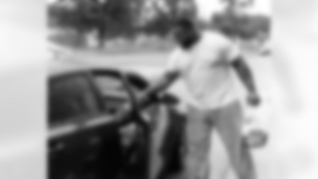 New Orleans Saints defensive tackle Davon Godchaux hosted a Thanksgiving turkey distribution for local residents at the COPAC Community Center on Nov. 25, 2025. The Plaquemine High School football team assisted Godchaux in the giveaway.