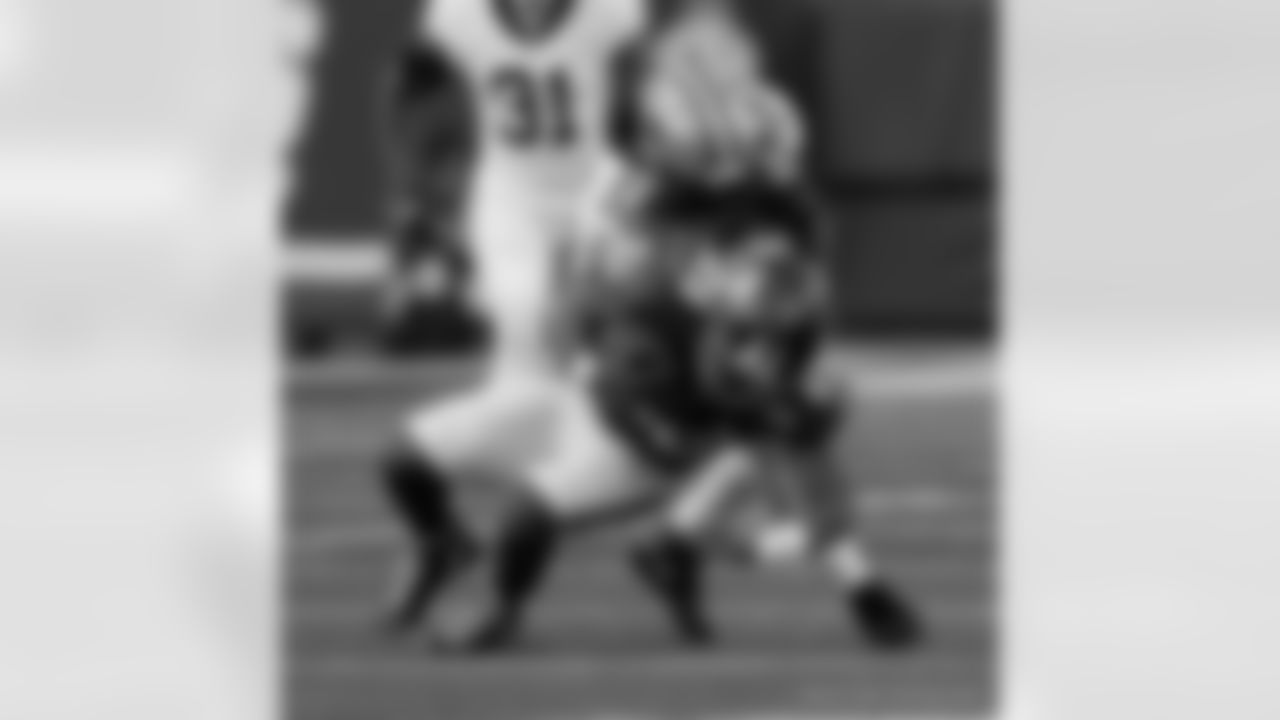 LB Demario Davis (56) makes a tackle during the New Orleans Saints game against the New York Giants for Week 14 of the 2024 NFL Season on Dec. 8, 2024 at MetLife Stadium.