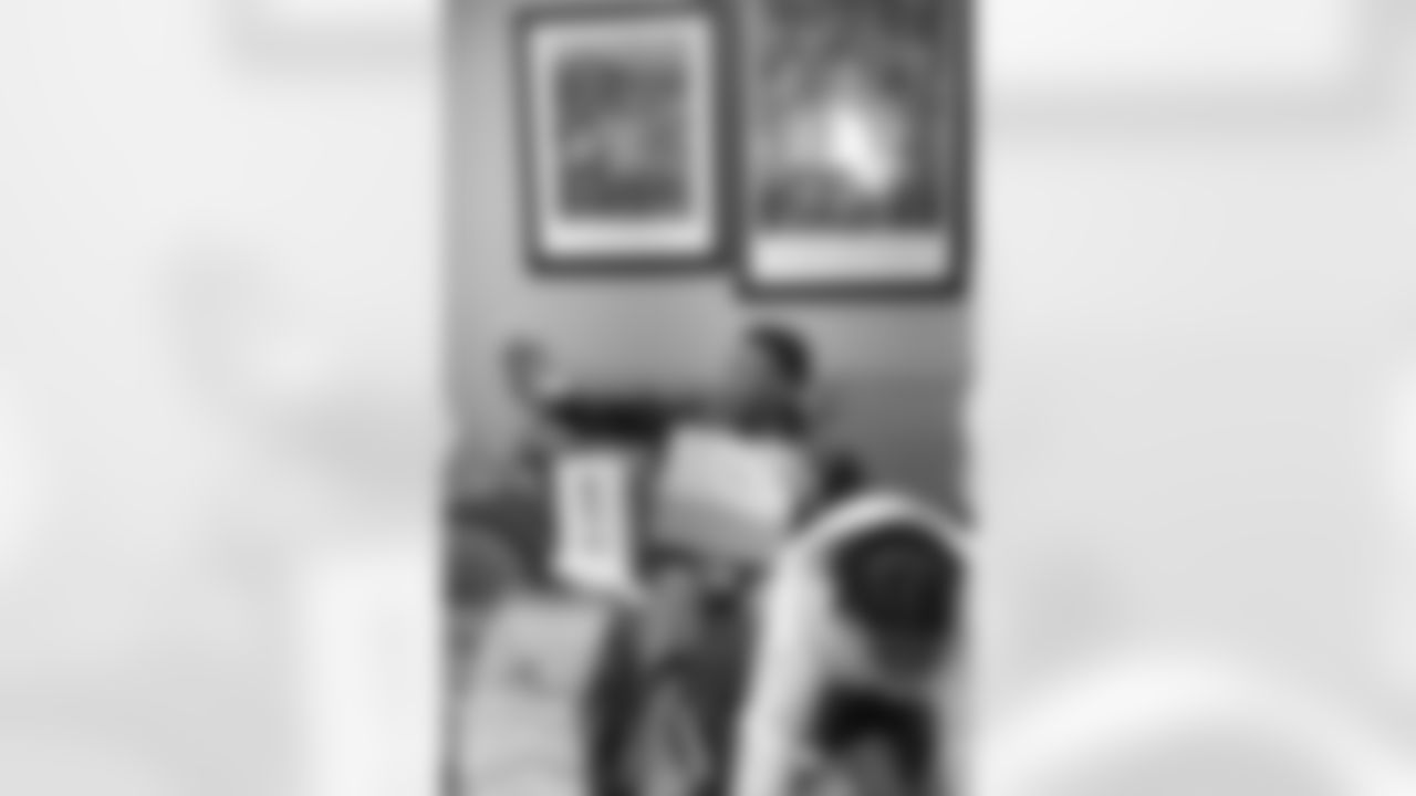 New Orleans Saints tight end Juwan Johnson, cornerback Alontae Taylor, and wide receiver Devaughn Vele attended the Louisiana Cat Hope Ignites Holiday Party on Tuesday, Dec. 16, 2025.