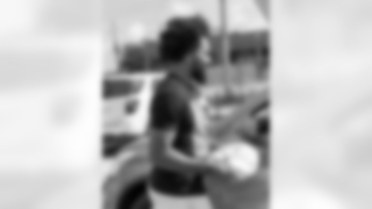 Chris Olave and The Olave Family Foundation volunteered with Lighthouse Nola and Second Harvest Food Bank for their Thanksgiving turkey drive through on Nov. 25, 2025.